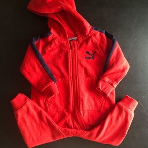 - Red & black one piece with full zip and hood